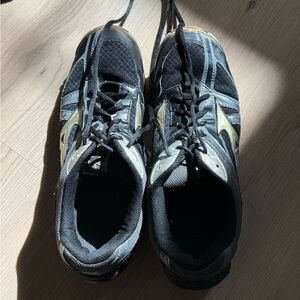 Women’s Mizuno Black and Gold indoor volleyball court shoes